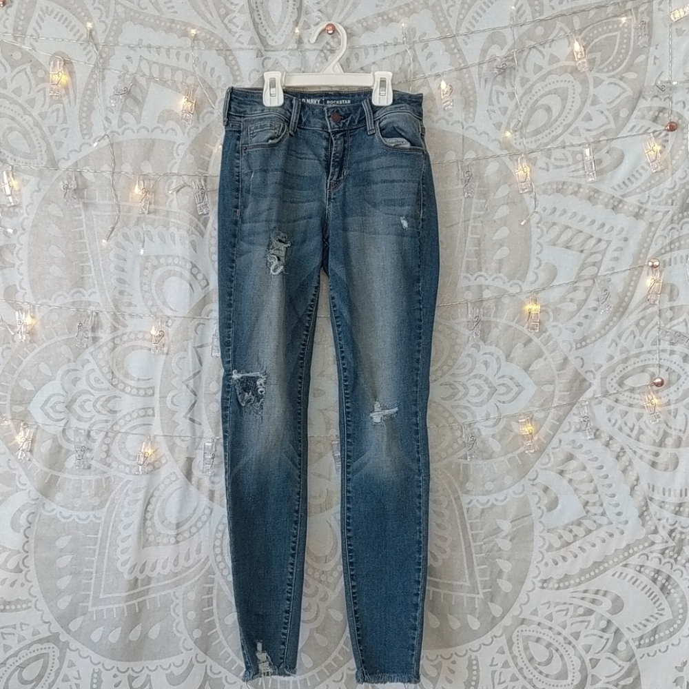 Rockstar Mid rise holy jeans